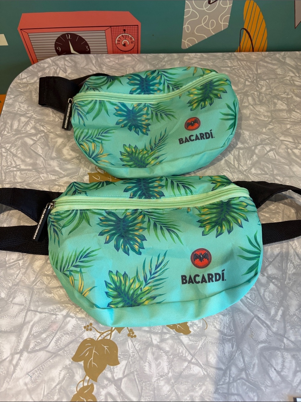 2 new matching Bacardi Tropical Print Teal Fanny Pack. Great for festivals.